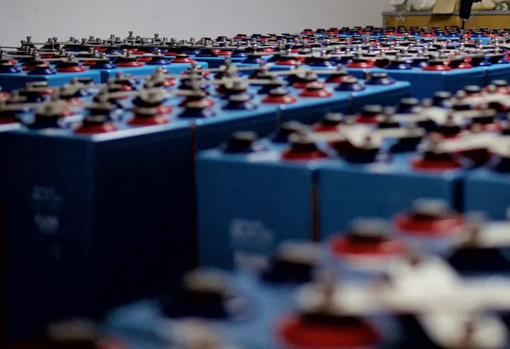 Close-up of battery terminals in rows